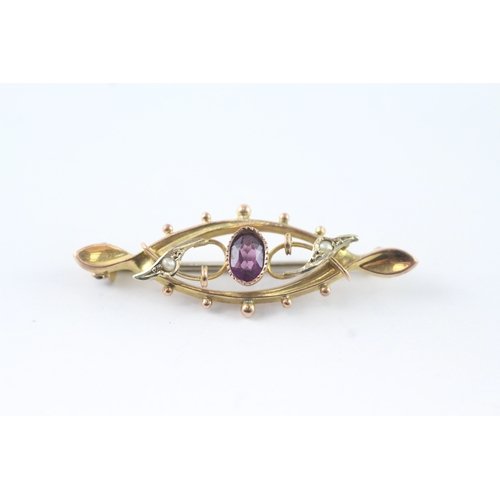 190 - 9ct gold amethyst and pearl twist bar brooch (2g)