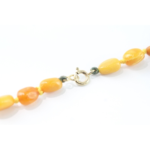 191 - 9ct gold clasped amber necklace (39g)