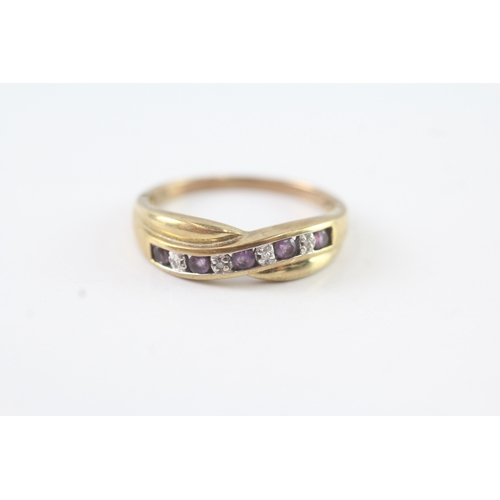 194 - 9ct gold amethyst & diamond cross-over ring (1.9g) Size P