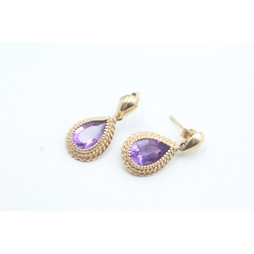 21 - 9ct gold pear cut amethyst drop earrings (3g)