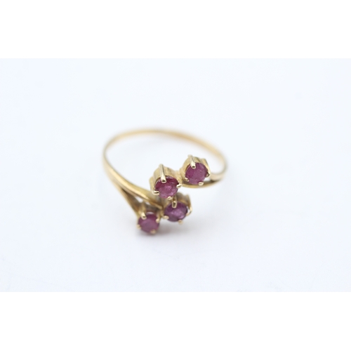 38 - 9ct gold ruby 4 stone dress ring (1.2g) Size K 1/2