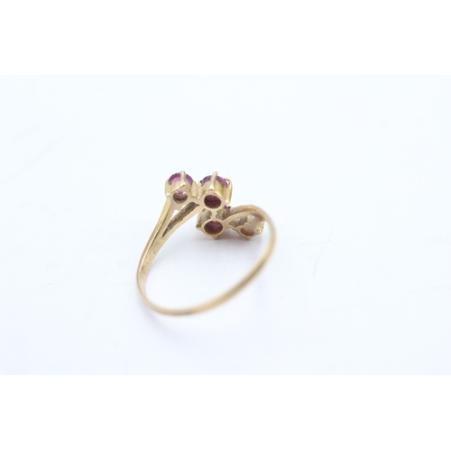 38 - 9ct gold ruby 4 stone dress ring (1.2g) Size K 1/2