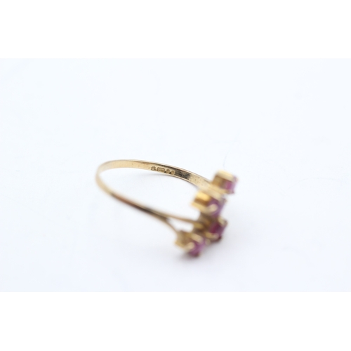 38 - 9ct gold ruby 4 stone dress ring (1.2g) Size K 1/2