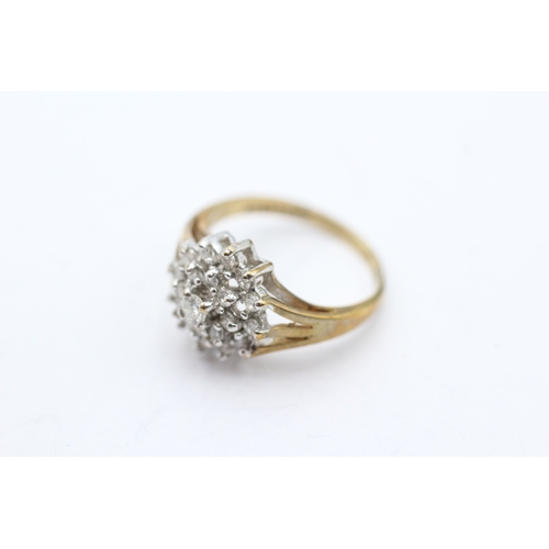 55 - 9ct gold diamond cluster ring, claw set (2.7g) Size L