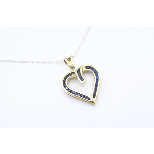 56 - 14ct gold sapphire heart shape pendant with a 9ct gold chain (2g)