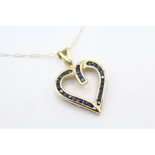 56 - 14ct gold sapphire heart shape pendant with a 9ct gold chain (2g)