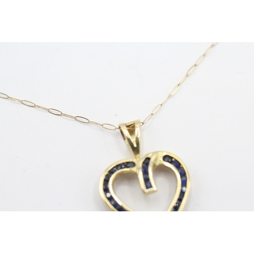 56 - 14ct gold sapphire heart shape pendant with a 9ct gold chain (2g)