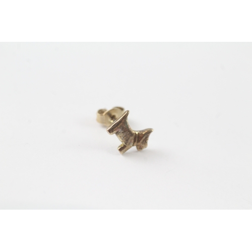 62 - 9ct gold dog stud earrings (1g)