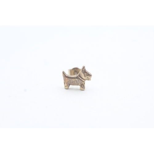 62 - 9ct gold dog stud earrings (1g)