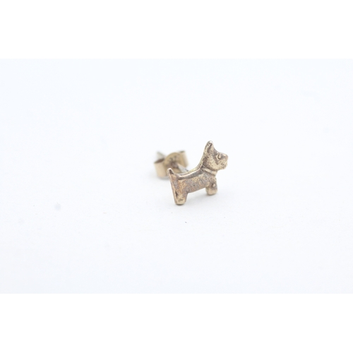 62 - 9ct gold dog stud earrings (1g)