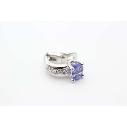 64 - 18ct white gold tanzanite and diamond set clip-on earrings (8.3g)