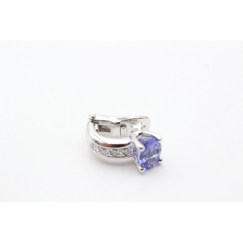 64 - 18ct white gold tanzanite and diamond set clip-on earrings (8.3g)