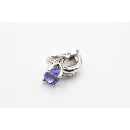 64 - 18ct white gold tanzanite and diamond set clip-on earrings (8.3g)