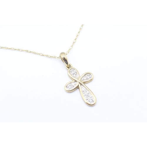 66 - 9ct gold diamond cross pendant necklace (1.8g)