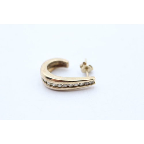 83 - 9ct gold diamond c-hoop earrings (4.9g)