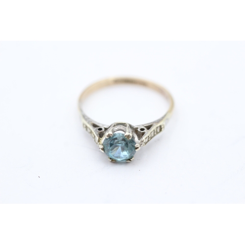 84 - 9ct gold blue zircon solitaire dress ring (2.4g) Size O 1/2