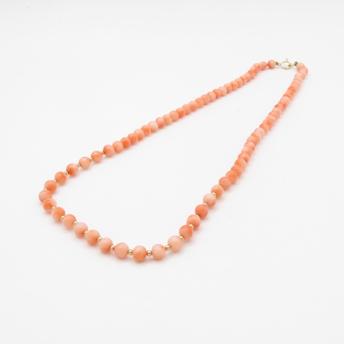 188 - 9ct gold clasped beaded coral necklace (12.2g)