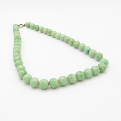 191 - 9ct gold clasped beaded jade necklace (53.5g)