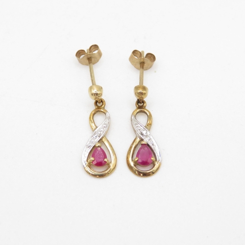 193 - 9ct gold diamond and ruby twist drop earrings (1.1g)