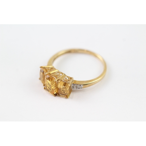 105 - 9ct gold diamond and citrine trilogy ring (2.2g) Size Q