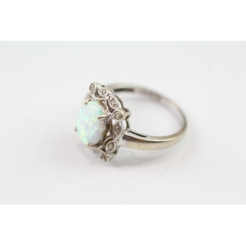 106 - 9ct gold opal and diamond ornate halo ring (2.9g) Size N 1/2