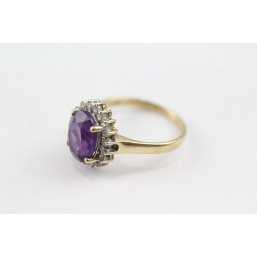 109 - 9ct gold amethyst and diamond halo ring (3g) Size M