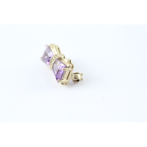 117 - 9ct gold amethyst & diamond bow brooch (2.4g)