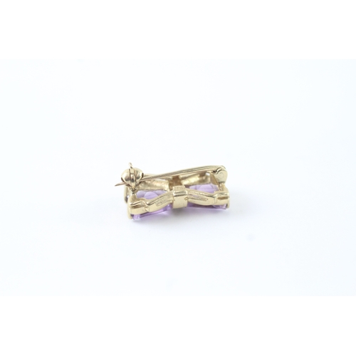 117 - 9ct gold amethyst & diamond bow brooch (2.4g)