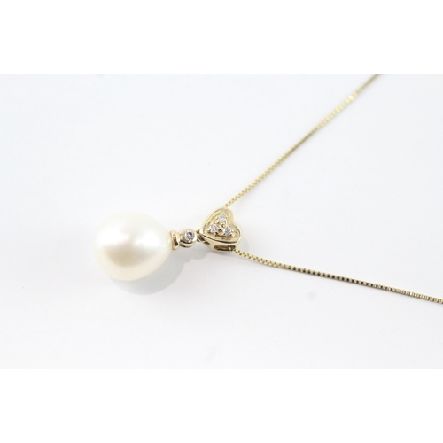 124 - 14ct gold cultured pearl & diamond drop pendant necklace (2.9g)