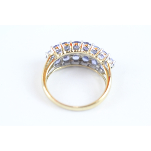 138 - 9ct gold tanzanite cluster dress ring (2.9g) Size M