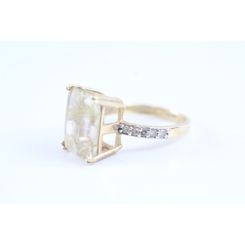 139 - 9ct gold claw set rutile quartz & diamond shoulder dress ring (3g) Size K