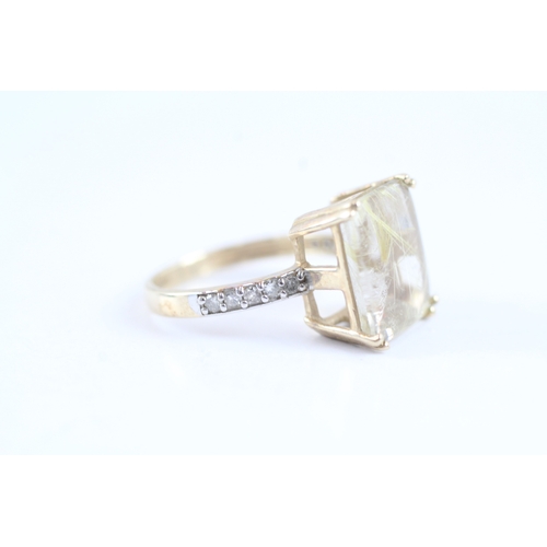 139 - 9ct gold claw set rutile quartz & diamond shoulder dress ring (3g) Size K