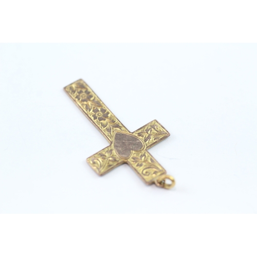 151 - 9ct gold foliate with heart design cross pendant (2g)