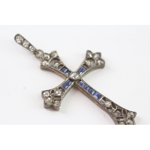 153 - 9ct gold and silver diamond and sapphire cross pendant (3.6g)