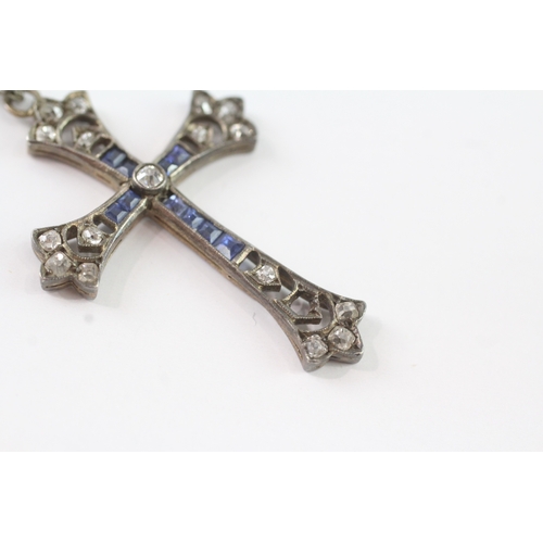 153 - 9ct gold and silver diamond and sapphire cross pendant (3.6g)