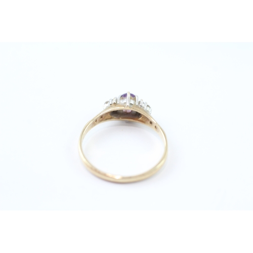 154 - 9ct gold cubic zirconia and amethyst set ring (1.8g) Size P