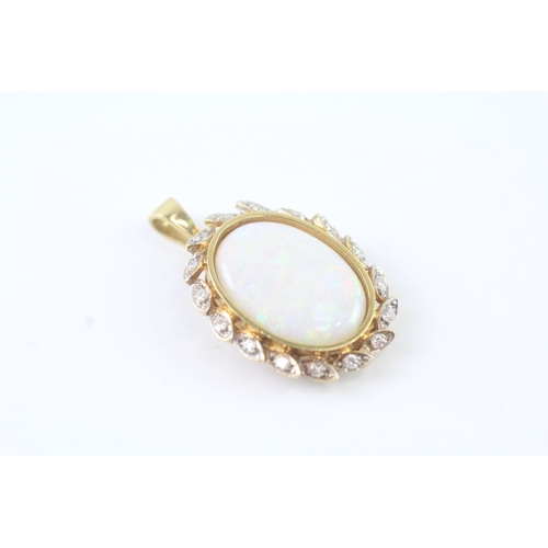 161 - 18ct gold diamond and opal pendant (6.4g)