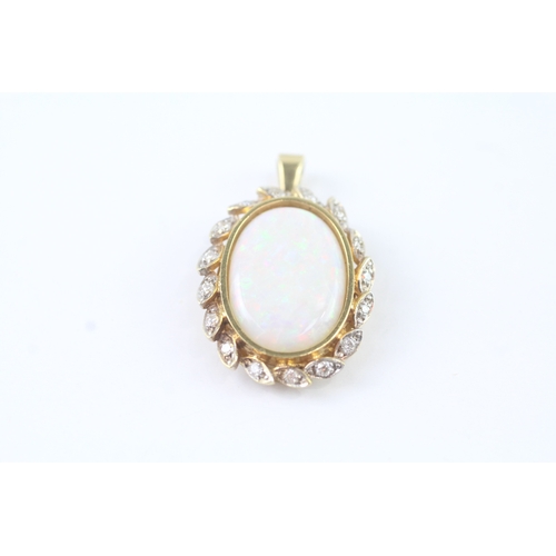 161 - 18ct gold diamond and opal pendant (6.4g)