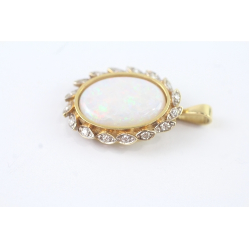 161 - 18ct gold diamond and opal pendant (6.4g)