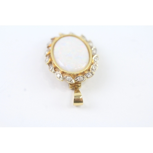 161 - 18ct gold diamond and opal pendant (6.4g)