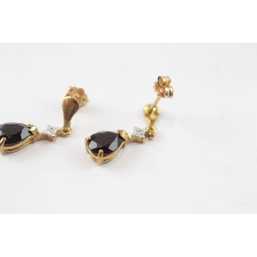 164 - 9ct gold garnet and diamond pear drop earrings (1.3g)