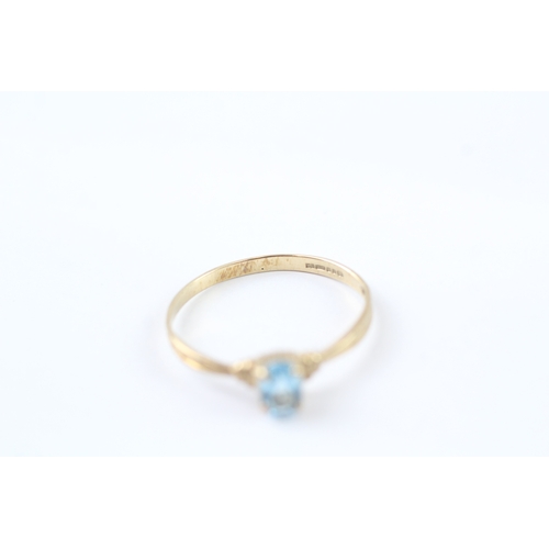 168 - 9ct gold blue gemstone solitaire dress ring (1.1g) Size P