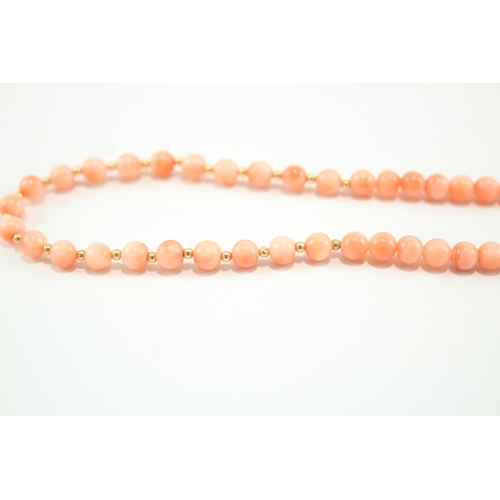 188 - 9ct gold clasped beaded coral necklace (12.2g)