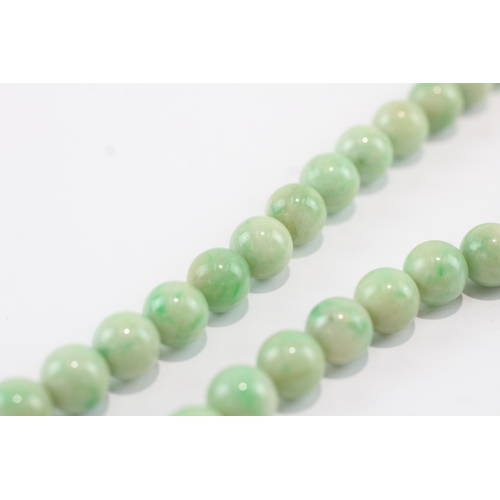 191 - 9ct gold clasped beaded jade necklace (53.5g)