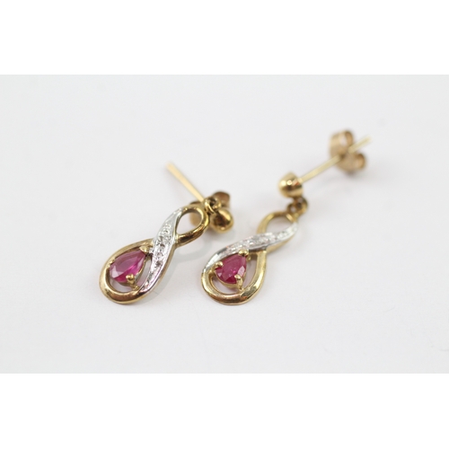 193 - 9ct gold diamond and ruby twist drop earrings (1.1g)