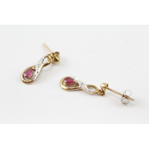 193 - 9ct gold diamond and ruby twist drop earrings (1.1g)