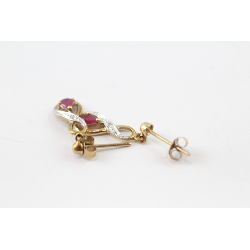 193 - 9ct gold diamond and ruby twist drop earrings (1.1g)