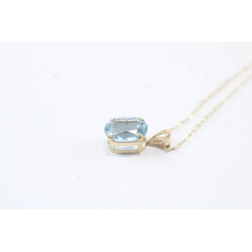 195 - 9ct gold blue gemstone pendant necklace (1g)