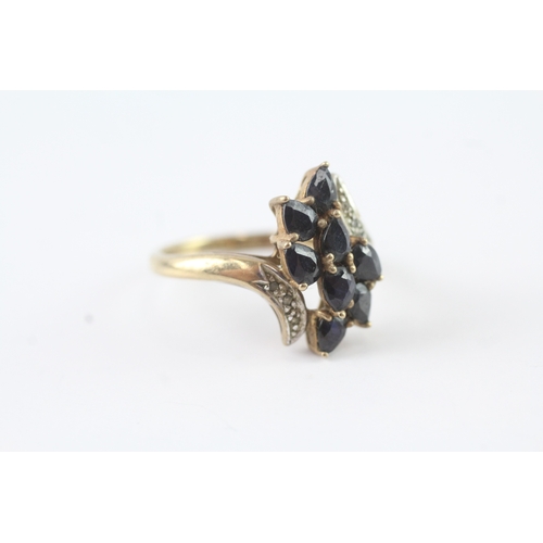 33 - 9ct gold diamond accented sapphire set spray cocktail ring (3.1g) Size P