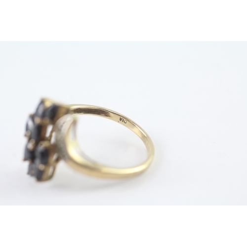 33 - 9ct gold diamond accented sapphire set spray cocktail ring (3.1g) Size P